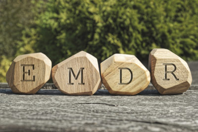 letters emdr engraved in wood